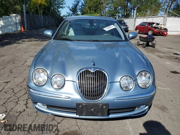 2003 Jaguar S-Type z VIN SAJEA01U53HM73131, wystawiony jako Copart lot #73430914 z przebiegiem 72 730 mil mil oraz Szkody całkowita. Historia ofert i sprzedaży dostępna na DreamBid. Obrazek 5.