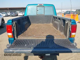 1997 Ford Ranger XL with VIN 1FTCR14A2VPA82467, listed as a IAAI auction lot 41871581 with 299,206 mi miles. Bid and sale history available at carsss.com. Image 19.