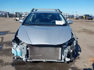 2021 Toyota Prius L Eco with VIN JTDKAMFU5M3130478, listed as a IAAI auction lot 41867606 with 52,223 mi miles. Bid and sale history available at carsss.com. Image 13.