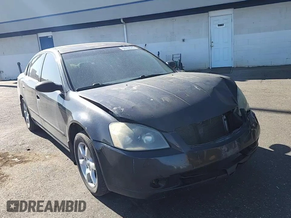 2005 Nissan Altima S z VIN 1N4AL11D75N445791, wystawiony jako Copart lot #60338565 z przebiegiem 258 687 mil mil oraz Szkoda całkowita • Salvage title. Historia ofert i sprzedaży dostępna na DreamBid. Obrazek 14.