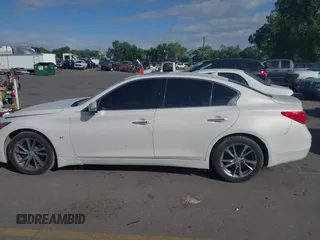 2015 Infiniti Q50 Premium z VIN JN1BV7ARXFM416349, wystawiony jako IAAI lot #42225088 z przebiegiem 194 127 mil mil oraz . Historia ofert i sprzedaży dostępna na DreamBid. Obrazek 14.