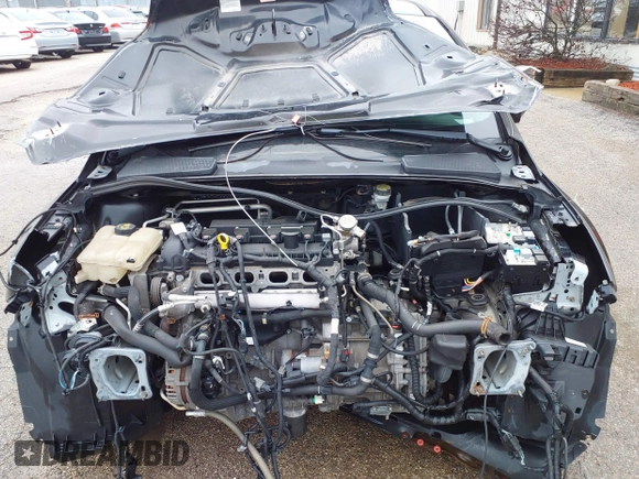 2014 Ford Focus Titanium with VIN 1FADP3J25EL310199, listed as a IAAI auction lot 40682901 with 84,885 mi miles and . Bid and sale history available at DreamBid. Image 10.