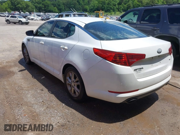 2013 Kia Optima LX z VIN 5XXGM4A7XDG197818, wystawiony jako IAAI lot #42340379 z przebiegiem 185 144 mil mil oraz . Historia ofert i sprzedaży dostępna na DreamBid. Obrazek 3.