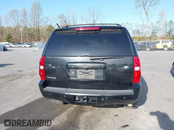 2014 Chevrolet Tahoe LT with VIN 1GNSCBE0XER202150, listed as a IAAI auction lot 41922771 with 168,693 mi miles and . Bid and sale history available at DreamBid. Image 16.