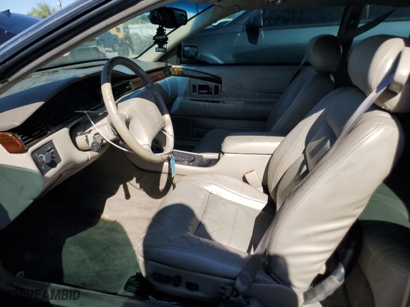 2000 Cadillac Eldorado with VIN 1G6EL12Y7YU135375, listed as a Copart auction lot 69503944 with 105,703 mi miles and Salvage Title. Bid and sale history available at carsss.com. Image 7.