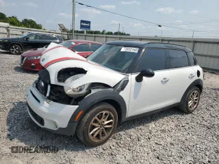 2015 MINI Countryman S with VIN WMWZC3C55FWT03267, listed as a Copart auction lot 59331605 with 116,964 mi miles and Salvage title. Bid and sale history available at DreamBid. Image 1.