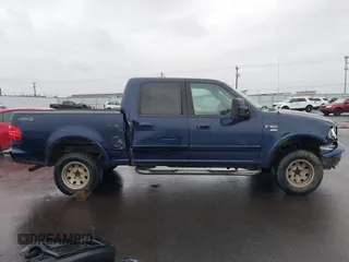 2003 Ford F-150 XLT with VIN 1FTRW08L33KC62060, listed as a IAAI auction lot 41618936 with 276,251 mi miles. Bid and sale history available at carsss.com. Image 13.