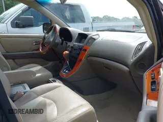 2003 Lexus RX 300 z VIN JTJGF10U530162469, wystawiony jako IAAI lot #42257609 z przebiegiem 238 259 mil mil oraz . Historia ofert i sprzedaży dostępna na DreamBid. Obrazek 5.
