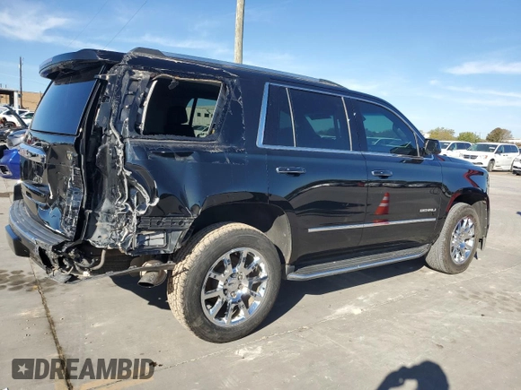 2019 GMC Yukon Denali with VIN 1GKS2CKJ9KR186604, listed as a Copart auction lot 82201124 with 110,069 mi miles and Salvage Title. Bid and sale history available at DreamBid. Image 3.