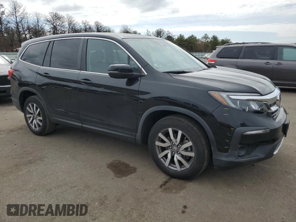 2020 Honda Pilot EX-L with VIN 5FNYF6H57LB068676, listed as a Copart auction lot 52678125 with 54,764 mi miles and Salvage title. Bid and sale history available at DreamBid. Image 4.