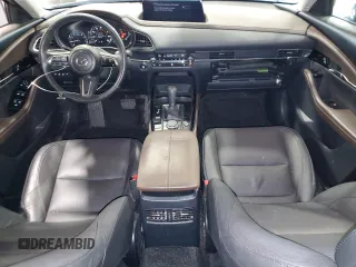 2024 Mazda CX-30 Premium z VIN 3MVDMBDY4RM689826, wystawiony jako Copart lot #43533135 z przebiegiem 10 372 mil mil oraz Szkody całkowita. Historia ofert i sprzedaży dostępna na DreamBid. Obrazek 8.