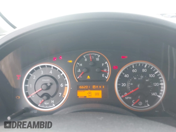 2014 Nissan Titan Pro-4X with VIN 1N6BA0EC3EN514358, listed as a IAAI auction lot 41636363 with 166,201 mi miles and . Bid and sale history available at DreamBid. Image 7.