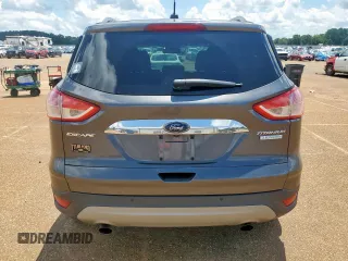 2015 Ford Escape Titanium with VIN 1FMCU0J92FUB80769, listed as a Copart auction lot 61988435 with 103,212 mi miles and Salvage title. Bid and sale history available at DreamBid. Image 6.