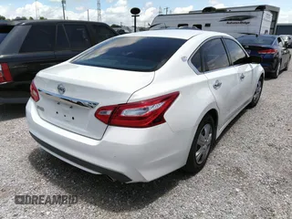 2017 Nissan Altima SV with VIN 1N4AL3AP0HC288742, listed as a IAAI auction lot 42560397 with 206,089 mi miles and . Bid and sale history available at DreamBid. Image 4.