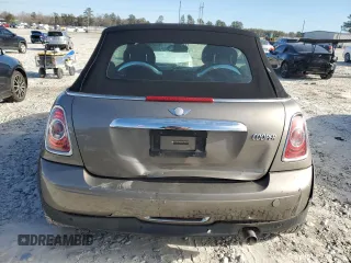 2011 MINI Convertible with VIN WMWZN3C53BT133576, listed as a Copart auction lot 87543835 with 69,999 mi miles and Salvage title. Bid and sale history available at DreamBid. Image 6.