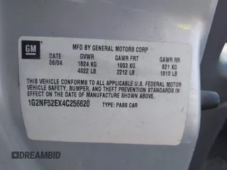 2004 Pontiac Grand Am SE1 with VIN 1G2NF52EX4C256620, listed as a IAAI auction lot 41423079 with 1 mi miles. Bid and sale history available at carsss.com. Image 9.