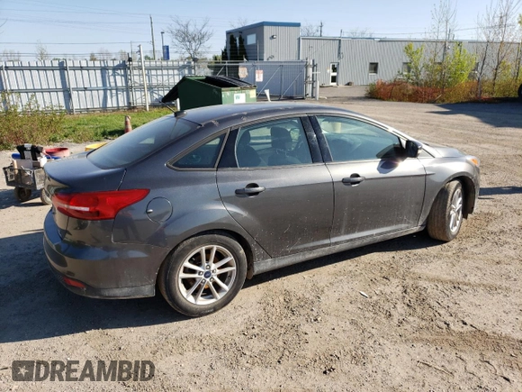 2018 Ford Focus SE z VIN 1FADP3FE4JL306237, wystawiony jako Copart lot #56482215 z przebiegiem 102 241 mil mil oraz Czysty tytuł • Clean title. Historia ofert i sprzedaży dostępna na DreamBid. Obrazek 3.