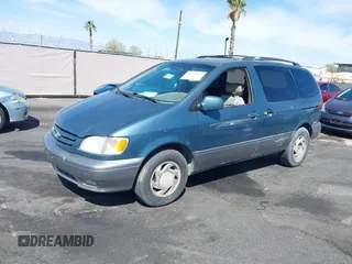 2001 Toyota Sienna LE with VIN 4T3ZF13C71U395907, listed as a IAAI auction lot 41935693 with 227,543 mi miles. Bid and sale history available at carsss.com. Image 2.