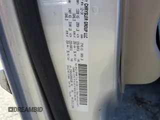 2011 Dodge Grand Caravan SXT with VIN 2D4RN4DG0BR603288, listed as a Copart auction lot 52589005 with 125,403 mi miles and Salvage Title. Bid and sale history available at DreamBid. Image 13.