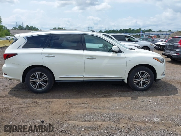 2020 Infiniti QX60 Luxe with VIN 5N1DL0MM2LC506031, listed as a IAAI auction lot 42701561 with 31,424 mi miles and . Bid and sale history available at DreamBid. Image 13.
