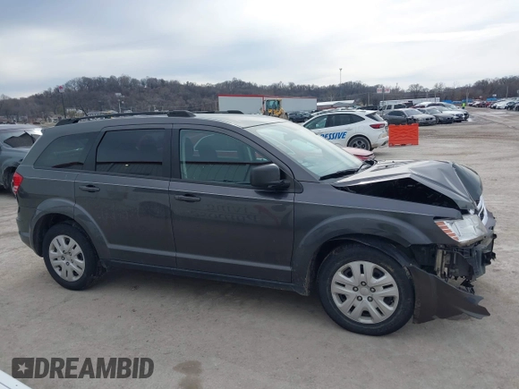 2017 Dodge Journey SE with VIN 3C4PDCABXHT694909, listed as a IAAI auction lot 41640828 with 188,657 mi miles and . Bid and sale history available at DreamBid. Image 13.