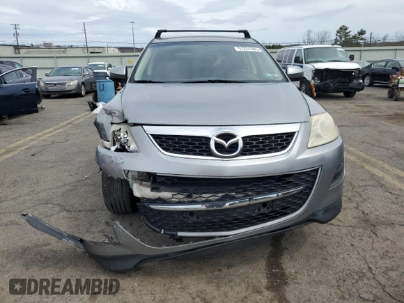 2010 Mazda CX-9 Grand Touring z VIN JM3TB3MV5A0210214, wystawiony jako Copart lot #51251585 z przebiegiem 138 885 mil mil oraz Szkoda całkowita • Salvage title. Historia ofert i sprzedaży dostępna na DreamBid. Obrazek 5.