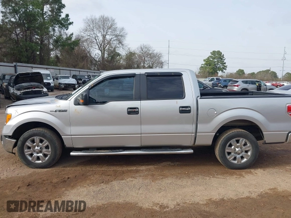 2012 Ford F-150 XL with VIN 1FTFW1CF5CFB63372, listed as a IAAI auction lot 41747703 with 202,219 mi miles. Bid and sale history available at carsss.com. Image 14.