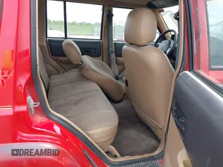 1999 Jeep Cherokee Sport with VIN 1J4FT68S6XL511158, listed as a IAAI auction lot 42170917 with 251,442 mi miles and . Bid and sale history available at DreamBid. Image 8.