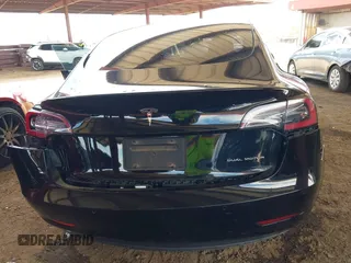 2022 Tesla Model 3 Long Range with VIN 5YJ3E1EB3NF257077, listed as a IAAI auction lot 42086629 with Not Provided miles and . Bid and sale history available at DreamBid. Image 6.