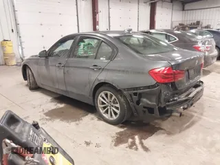 2018 BMW 3 Series 320i xDrive with VIN WBA8E5G50JNU48047, listed as a IAAI auction lot 41564022 with 69,971 mi miles. Bid and sale history available at carsss.com. Image 3.