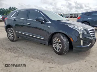 2017 Cadillac XT5 Luxury FWD with VIN 1GYKNBRS3HZ101867, listed as a Copart auction lot 60923215 with 130,209 mi miles and Salvage title. Bid and sale history available at DreamBid. Image 4.