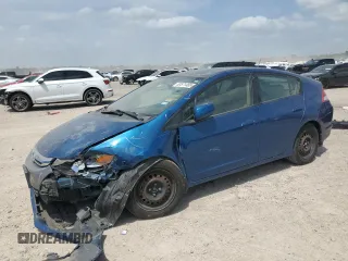 2012 Honda Insight z VIN JHMZE2H32CS004660, wystawiony jako Copart lot #53571485 z przebiegiem 146 605 mil mil oraz Nie do naprawy • Non repairable. Historia ofert i sprzedaży dostępna na DreamBid. Obrazek 1.