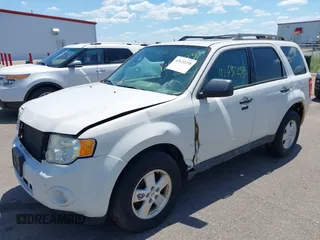 2011 Ford Escape XLT z VIN 1FMCU9DG3BKB24876, wystawiony jako IAAI lot #42632258 z przebiegiem 164 761 mil mil oraz . Historia ofert i sprzedaży dostępna na DreamBid. Obrazek 2.