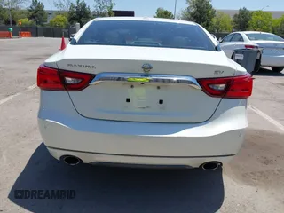 2016 Nissan Maxima SV with VIN 1N4AA6AP6GC903638, listed as a IAAI auction lot 42180421 with 124,586 mi miles and . Bid and sale history available at DreamBid. Image 16.