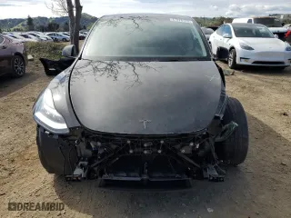 2022 Tesla Model Y Long Range with VIN 7SAYGDEE2NF575433, listed as a Copart auction lot 47576175 with 53,642 mi miles and Salvage Title. Bid and sale history available at carsss.com. Image 5.