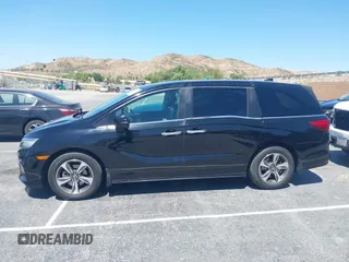 2018 Honda Odyssey Touring with VIN 5FNRL6H8XJB026247, listed as a IAAI auction lot 42298961 with 66,571 mi miles and . Bid and sale history available at DreamBid. Image 14.