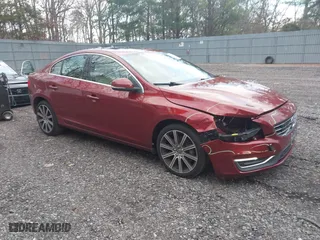 2016 Volvo S60 T6 Drive-E Platinum with VIN YV149MFM7G2397613, listed as a IAAI auction lot 41209093 with 80,695 mi miles. Bid and sale history available at carsss.com. Image 1.