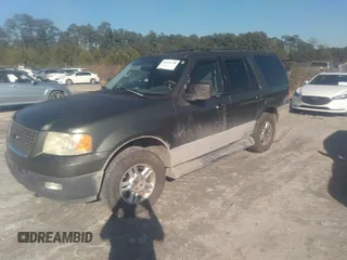 2004 Ford Expedition XLT with VIN 1FMPU16W64LA01397, listed as a IAAI auction lot 41494738 with 214,192 mi miles. Bid and sale history available at carsss.com. Image 2.