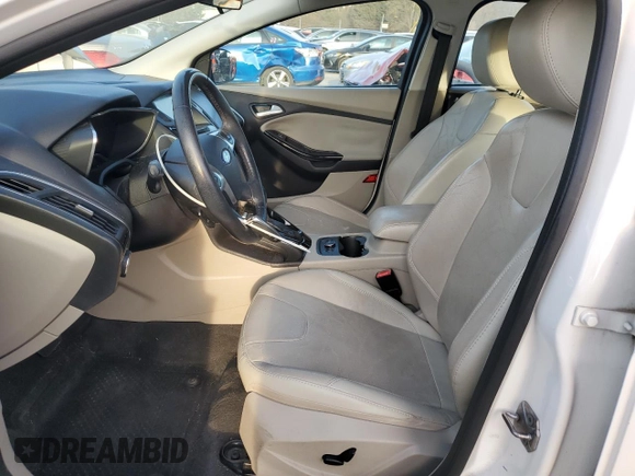2013 Ford Focus Electric z VIN 1FADP3R46DL235601, wystawiony jako Copart lot #80040644 z przebiegiem Nie podano mil oraz Czysty tytuł • Clean title. Historia ofert i sprzedaży dostępna na DreamBid. Obrazek 7.