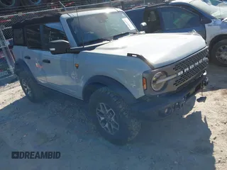 2023 Ford Bronco z VIN 1FMEE5DP7PLB81565, wystawiony jako IAAI lot #41891295 z przebiegiem 27 890 mil mil oraz . Historia ofert i sprzedaży dostępna na DreamBid. Obrazek 1.