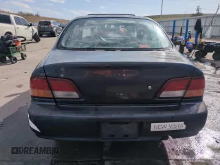 1997 Nissan Maxima GXE with VIN JN1CA21D0VT201140, listed as a Copart auction lot 52230495 with 286,440 mi miles and Clean title. Bid and sale history available at DreamBid. Image 6.
