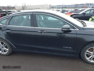2015 Ford Fusion Titanium Hybrid with VIN 3FA6P0RU6FR299374, listed as a IAAI auction lot 41576007 with 191,285 mi miles. Bid and sale history available at carsss.com. Image 13.