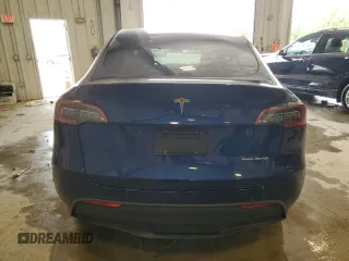 2024 Tesla Model Y Long Range с VIN 7SAYGDEE8RA270862, выставлен на аукционе Copart как лот 58099875 с пробегом 24 856 миль миль и На запчасти • Non repairable. История ставок и продаж доступна на DreamBid. Изображение 6.