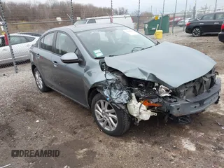 2012 Mazda Mazda3 i Touring with VIN JM1BL1V83C1542258, listed as a IAAI auction lot 41988625 with 94,911 mi miles. Bid and sale history available at carsss.com. Image 1.