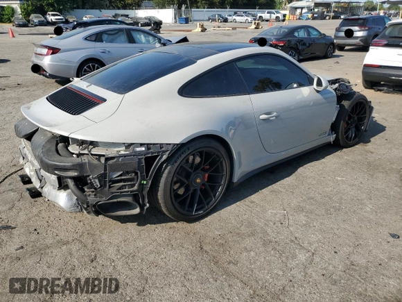 2018 Porsche 911 Carrera S with VIN WP0AB2A93JS122882, listed as a Copart auction lot 64508164 with 36,509 mi miles and Salvage Title. Bid and sale history available at DreamBid. Image 3.