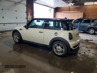 2009 MINI Hardtop S with VIN WMWMF73509TW83066, listed as a Copart auction lot 58603205 with 113,242 mi miles and Salvage title. Bid and sale history available at DreamBid. Image 2.