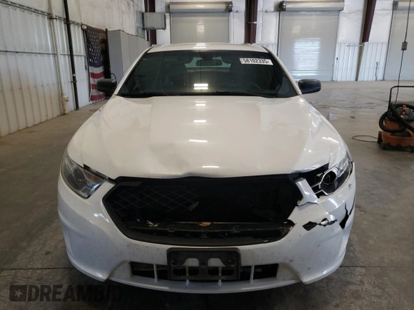 2013 Ford Police Interceptor with VIN 1FAHP2M84DG124494, listed as a Copart auction lot 58102335 with 157,614 mi miles and Salvage title. Bid and sale history available at DreamBid. Image 5.