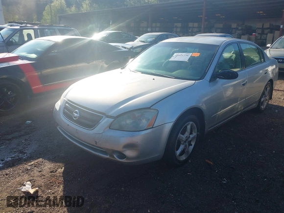 2004 Nissan Altima S with VIN 1N4AL11D34C140198, listed as a IAAI auction lot 41821256 with 182,905 mi miles. Bid and sale history available at carsss.com. Image 2.