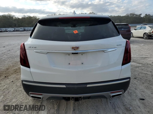 2024 Cadillac XT5 FWD Premium Luxury with VIN 1GYKNCRSXRZ745180, listed as a Copart auction lot 87627615 with 6,753 mi miles and Salvage Title. Bid and sale history available at carsss.com. Image 6.