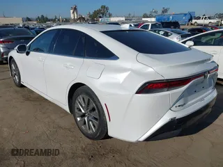 2023 Toyota Mirai XLE with VIN JTDAAAAA2PA009222, listed as a IAAI auction lot 42310523 with 21,287 mi miles and . Bid and sale history available at DreamBid. Image 3.